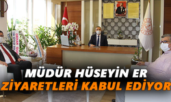 Müdür Hüseyin Er ziyaretleri kabul ediyor
