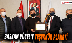 Başkan Yücel'e teşekkür plaketi